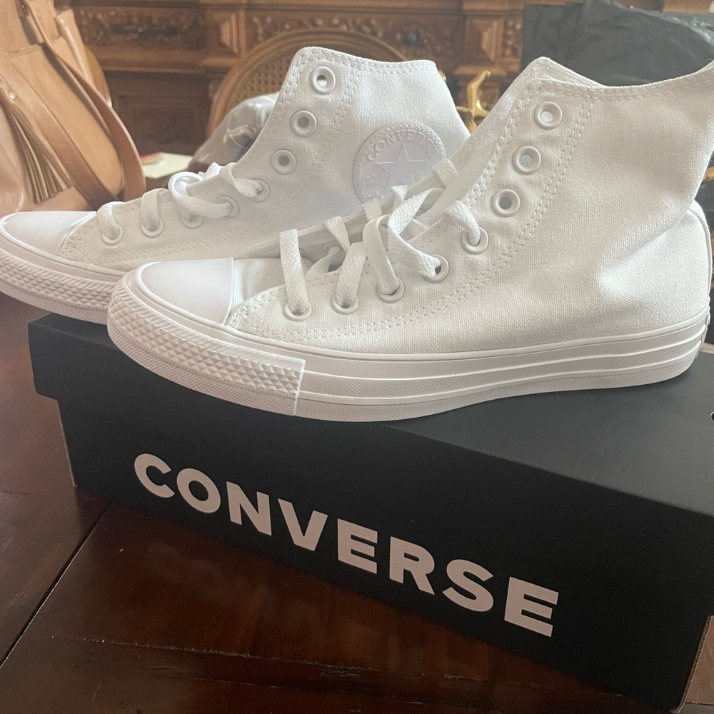 Brand new, in the box. All white converse